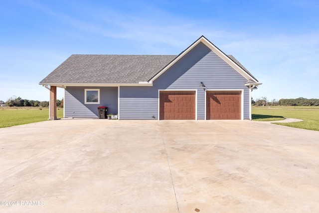 ranch-style house featuring a garage