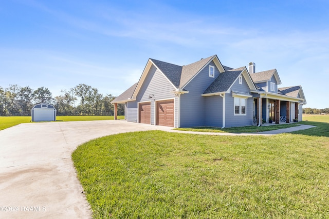 view of front of house featuring a front yard and a garage