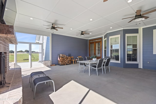 view of patio featuring ceiling fan