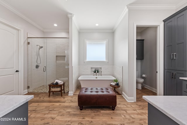 full bathroom with vanity, hardwood / wood-style flooring, and ornamental molding