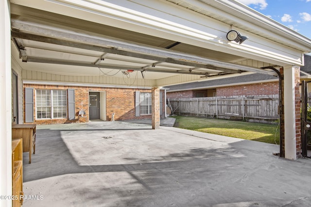 garage featuring a lawn