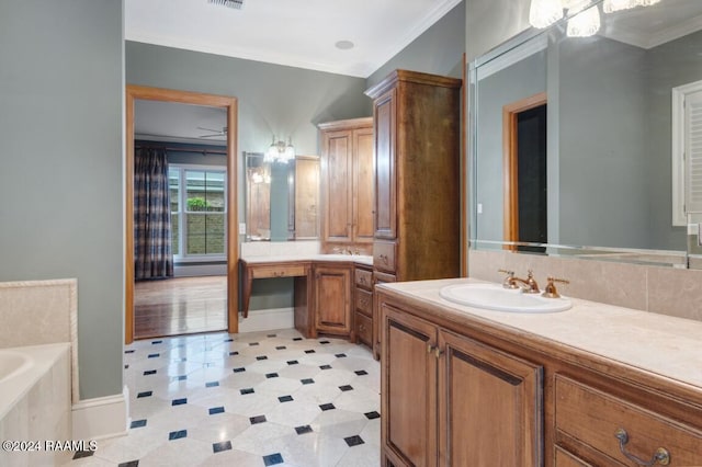 bathroom featuring a tub to relax in, vanity, and crown molding