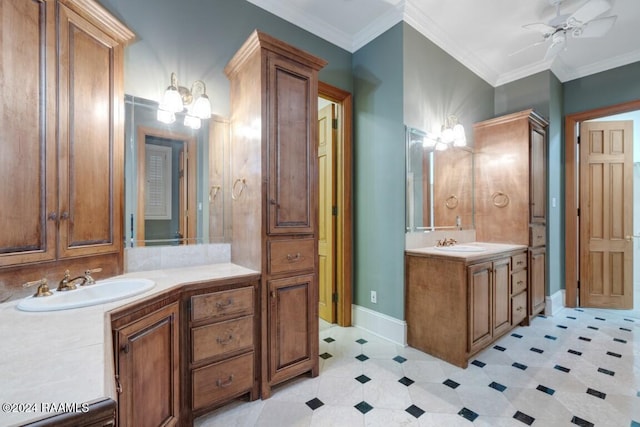 bathroom featuring ceiling fan, vanity, and crown molding