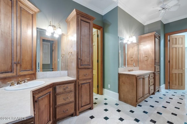106 Kings Walk, Lafayette, LA 70503 - bathroom with two vanities, ceiling fan, crown molding, a chandelier, and tile patterned floors