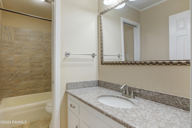 full bathroom featuring ornamental molding, vanity, a textured ceiling, bathtub / shower combination, and toilet