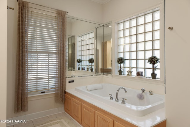 bathroom featuring a tub to relax in