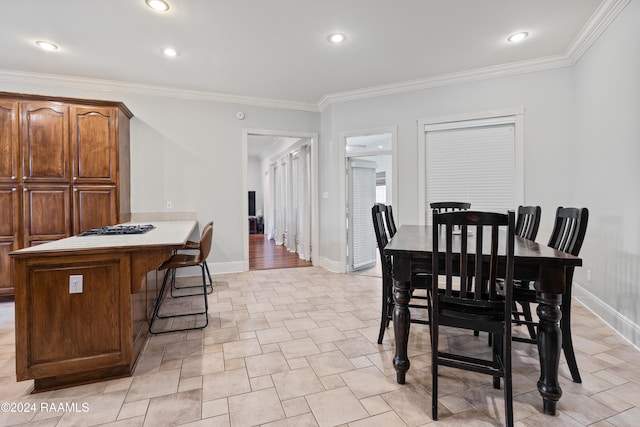 dining room with ornamental molding