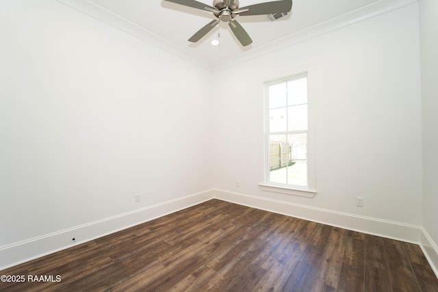 unfurnished room with baseboards, ceiling fan, dark wood-style flooring, and crown molding