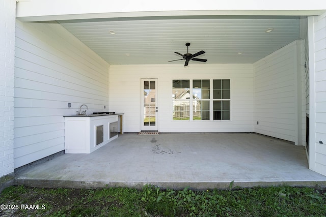 view of patio / terrace with ceiling fan