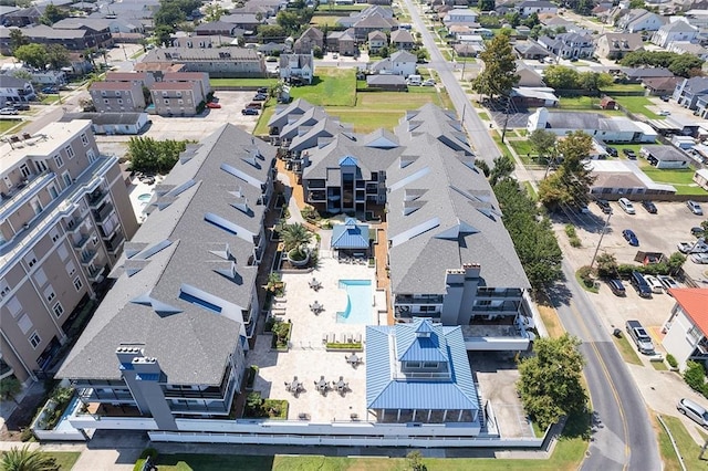 birds eye view of property with a residential view