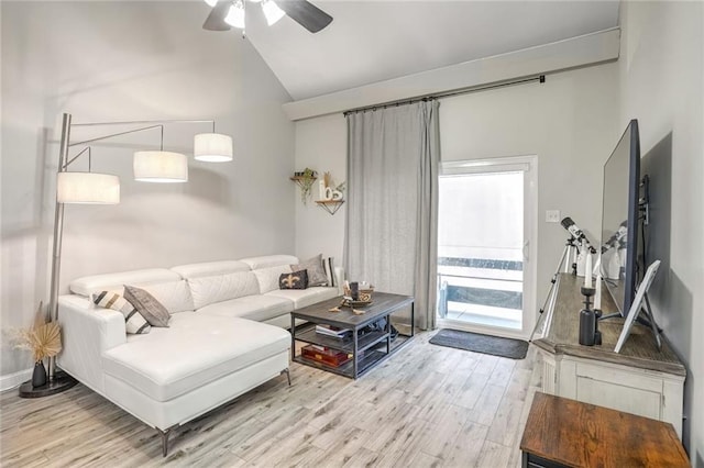 living room featuring high vaulted ceiling, ceiling fan, and wood finished floors