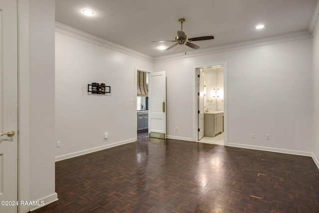 unfurnished room featuring dark parquet floors, ceiling fan, and crown molding