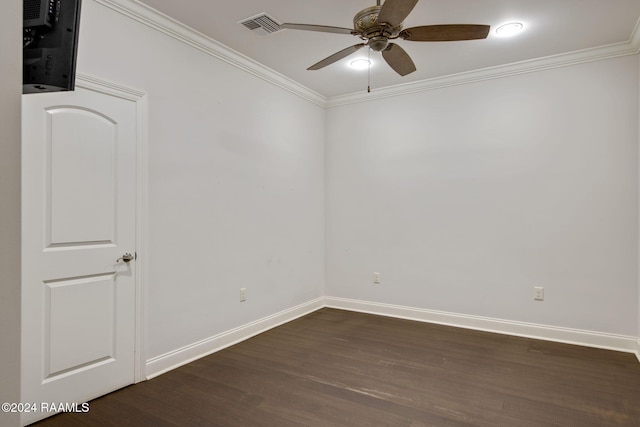 empty room with crown molding, ceiling fan, and dark wood-type flooring