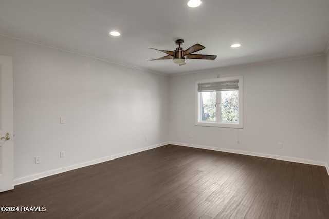 spare room with dark hardwood / wood-style floors, ceiling fan, and crown molding