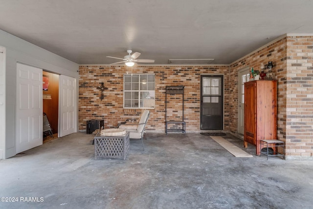 view of patio featuring ceiling fan