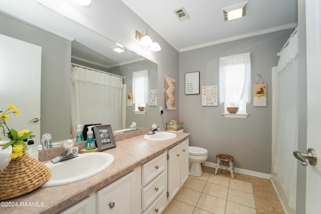 bathroom featuring toilet, vanity, tile patterned floors, and ornamental molding