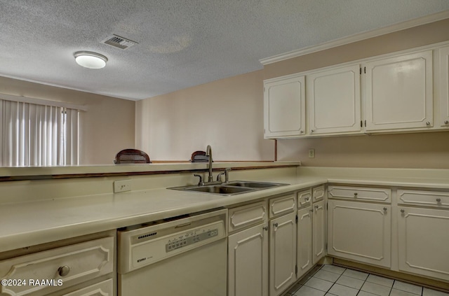 kitchen featuring dishwasher, white cabinets, sink, a textured ceiling, and light tile patterned flooring