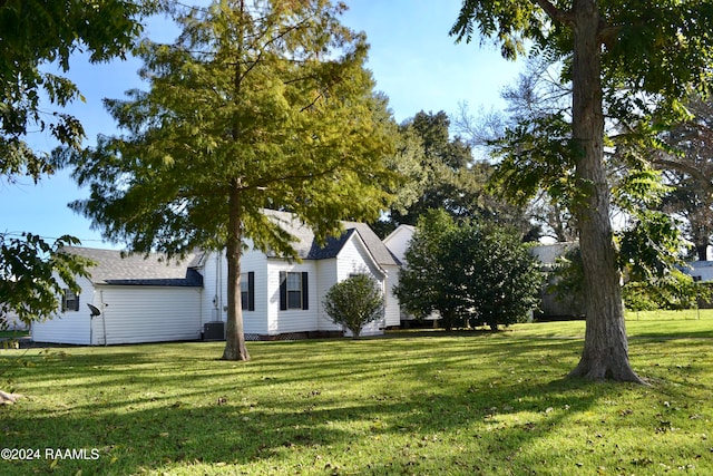 exterior space featuring a front lawn