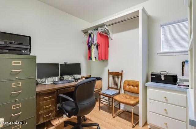 office space with light hardwood / wood-style flooring