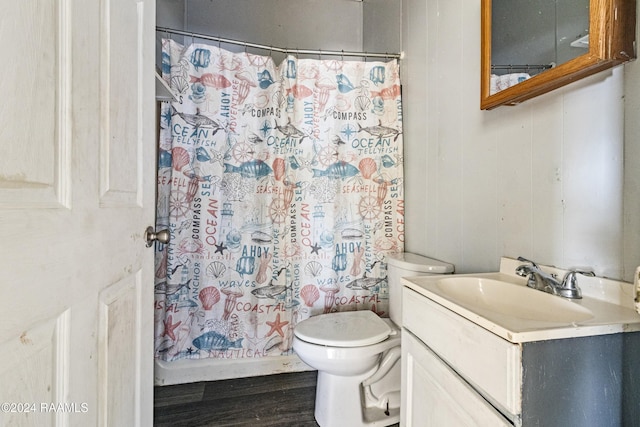 bathroom featuring hardwood / wood-style floors, vanity, and toilet