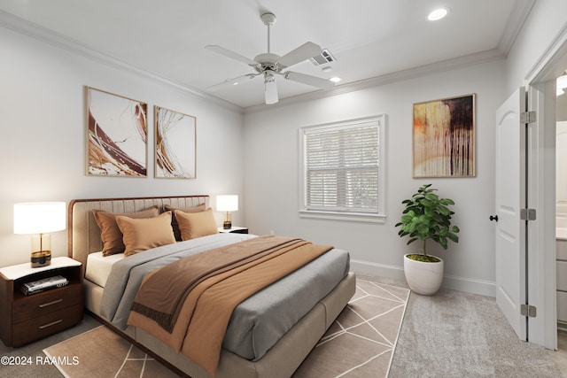 carpeted bedroom with ceiling fan and ornamental molding