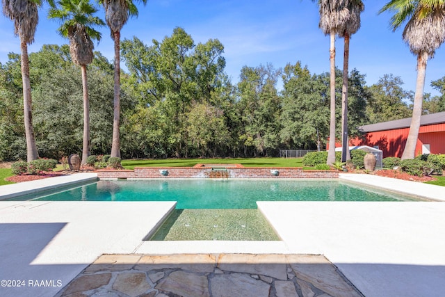 view of pool featuring a patio