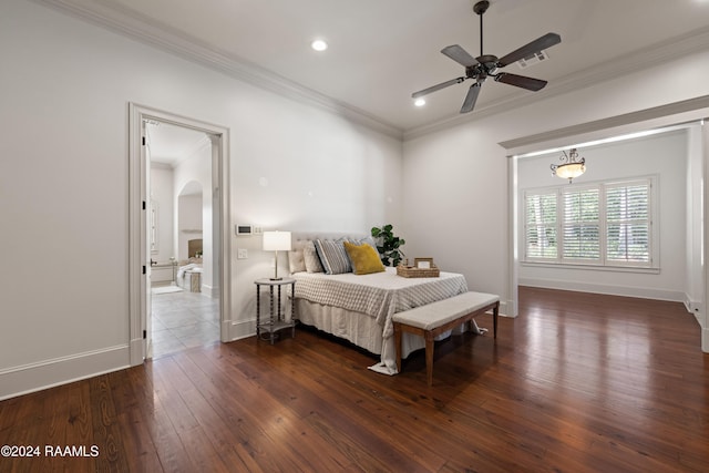 bedroom featuring ceiling fan, crown molding, and dark hardwood / wood-style floors