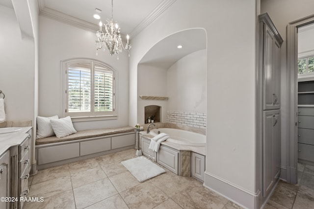 bathroom featuring a notable chandelier, vanity, ornamental molding, and a tub