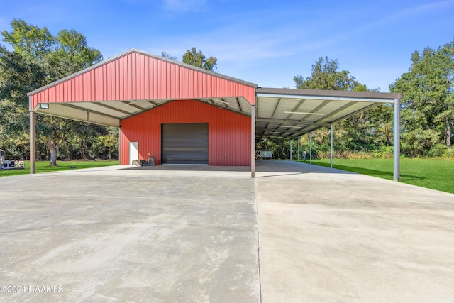 exterior space featuring a carport and a yard