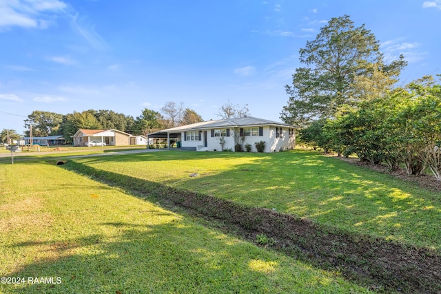 view of yard featuring a carport