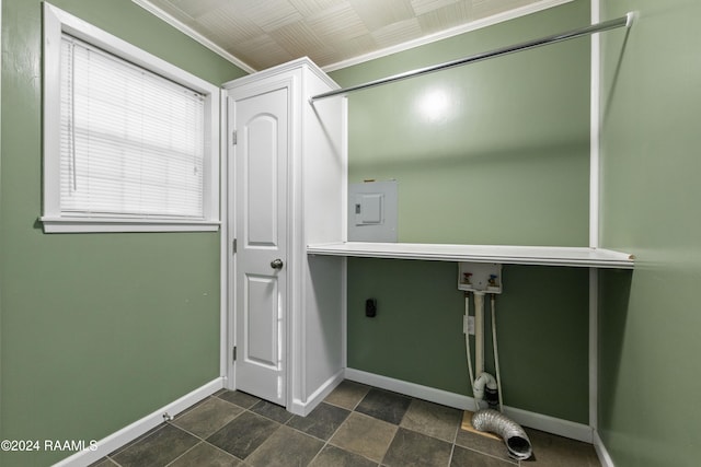 washroom with washer hookup, ornamental molding, cabinets, and electric dryer hookup