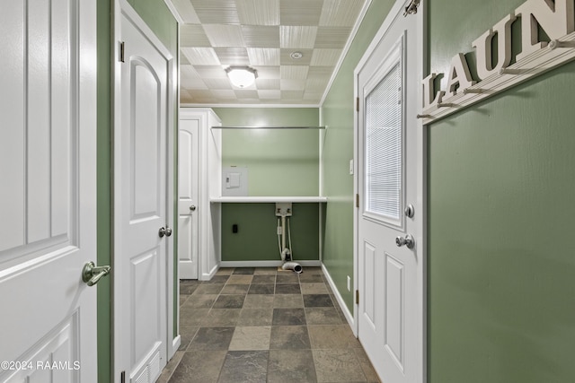 hallway featuring crown molding