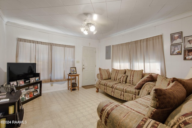 living room featuring electric panel, crown molding, and ceiling fan