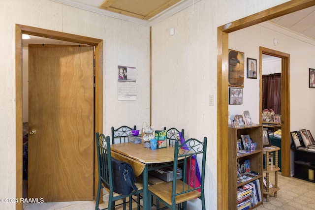 dining room featuring ornamental molding