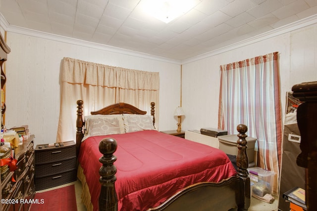 bedroom with crown molding