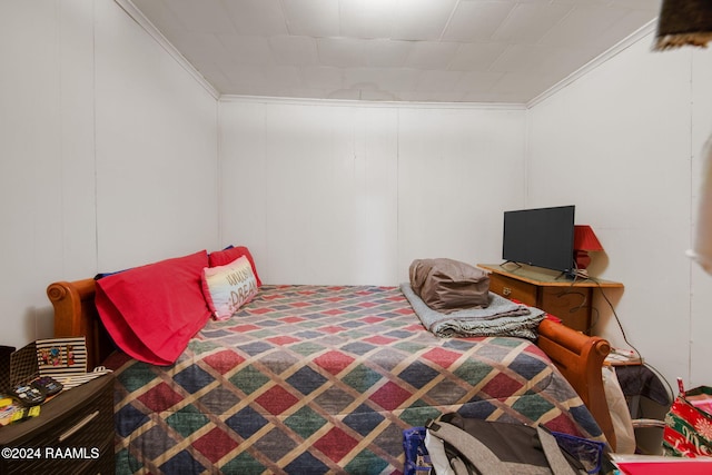 bedroom featuring ornamental molding