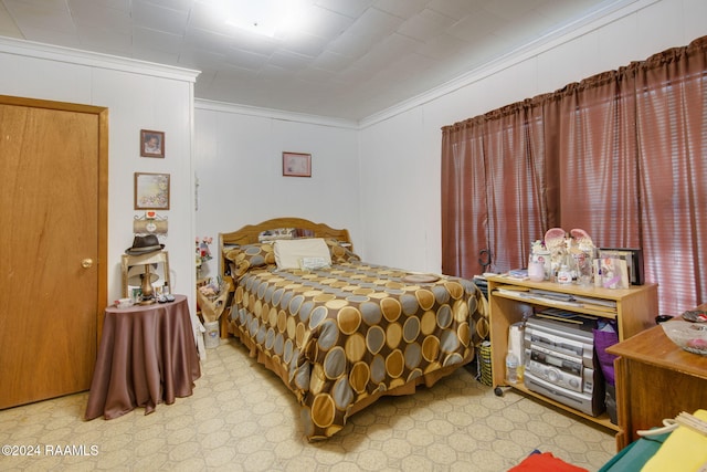 bedroom featuring ornamental molding