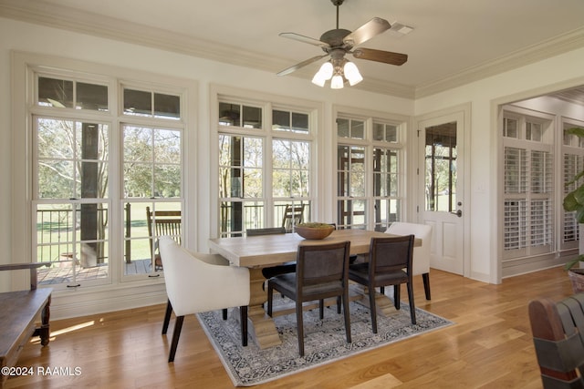 312 Shinnecock Hills Dr, Broussard, LA 70518 - dining space with healthy amount of natural light, ornamental molding, ceiling fan, and light wood finished floors