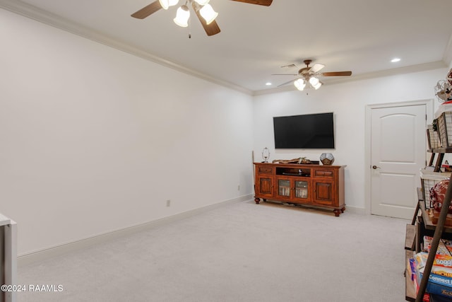 living room with light carpet, ceiling fan, and crown molding