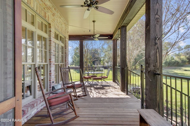 sunroom / solarium with ceiling fan and plenty of natural light