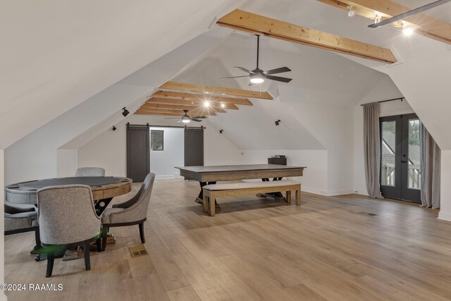 playroom with vaulted ceiling with beams, ceiling fan, french doors, and light hardwood / wood-style floors