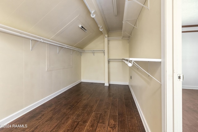 1412 US Highway 167, Abbeville, LA 70510 - spacious closet featuring hardwood / wood-style floors and vaulted ceiling