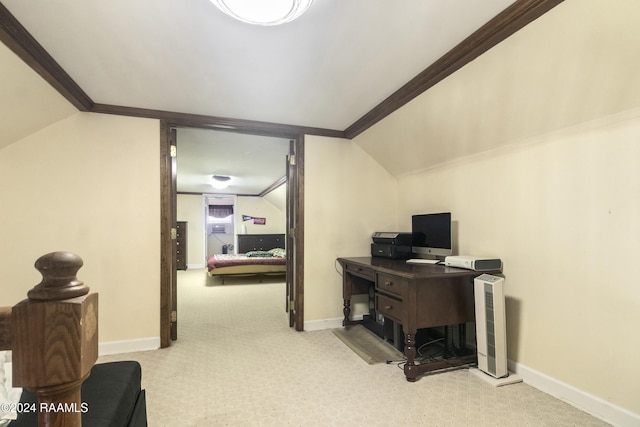 carpeted office space featuring vaulted ceiling and ornamental molding