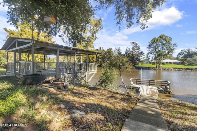 dock area with a water view