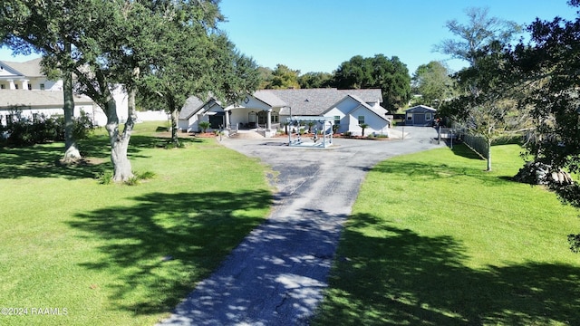 1412 US Highway 167, Abbeville, LA 70510 - single story home with a front lawn
