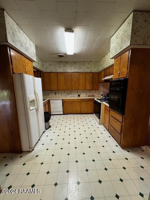 kitchen featuring white appliances