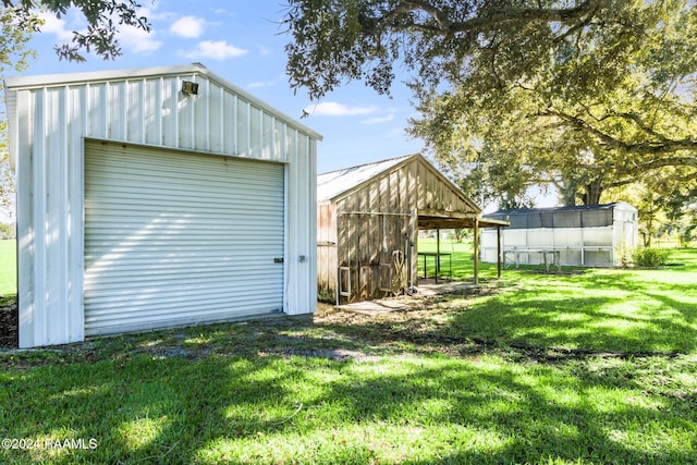 garage with a lawn