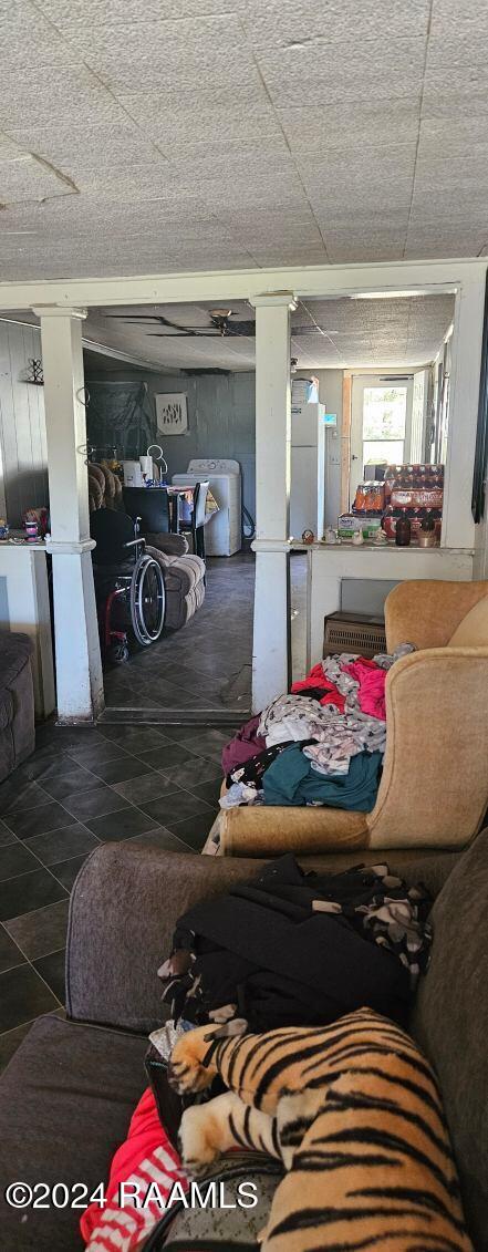 garage with white refrigerator