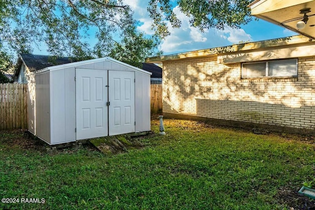 view of outdoor structure with a yard