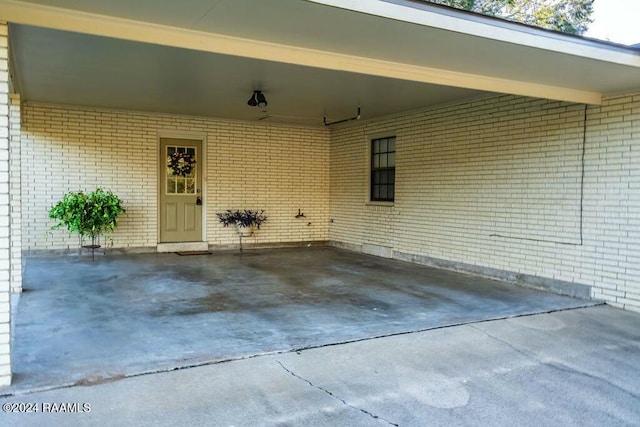 view of patio / terrace featuring a carport